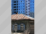 Городские контрасты. Как старинные "избушки" Барнаула уходят в тень современных высоток